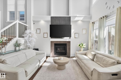 5915 19 Avenue, Edmonton, AB - Indoor Photo Showing Living Room With Fireplace