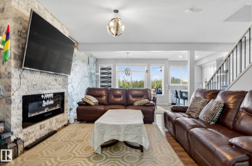 2171 51 Street, Edmonton, AB - Indoor Photo Showing Living Room With Fireplace