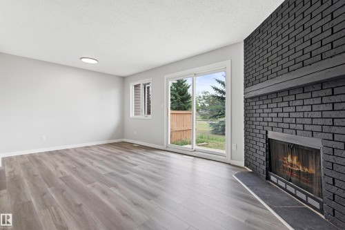 12 3115 119 Street, Edmonton, AB - Indoor With Fireplace