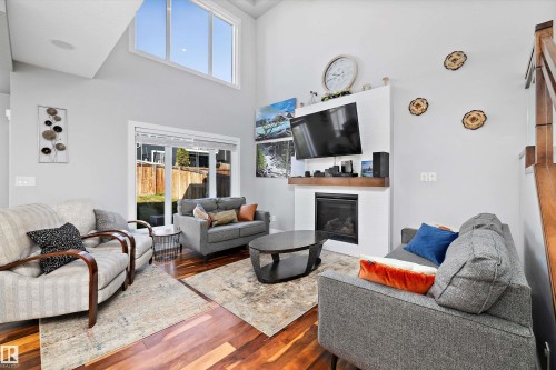 3380 Chickadee Drive, Edmonton, AB - Indoor Photo Showing Living Room With Fireplace