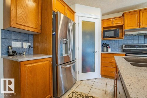 1119 114 Street, Edmonton, AB - Indoor Photo Showing Kitchen With Double Sink