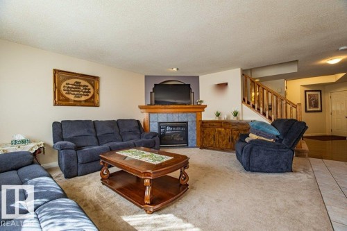 1119 114 Street, Edmonton, AB - Indoor Photo Showing Living Room With Fireplace