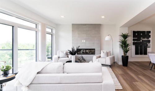 26 7121 May Crescent, Edmonton, AB - Indoor Photo Showing Living Room With Fireplace