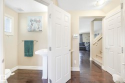Bathroom with dark wood finished floors and a textured ceiling - 