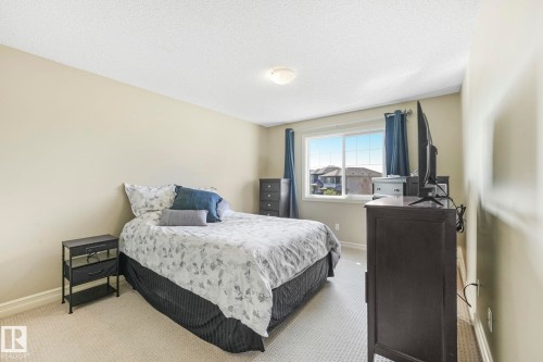 Bedroom featuring carpet floors and a textured ceiling - 6819 Cardinal Link, Edmonton, AB - Indoor Photo Showing Bedroom