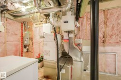 Utilities with tankless water heater and electric panel - 