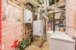 Utilities with tankless water heater and heating unit - 