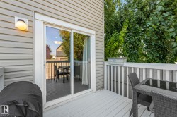 Deck featuring outdoor dining area and grilling area - 