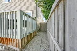 View of home's exterior with a gate - 