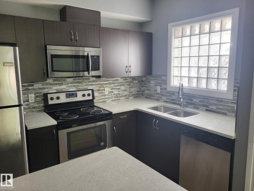 8607 108A Street, Edmonton, AB - Indoor Photo Showing Kitchen With Stainless Steel Kitchen With Double Sink With Upgraded Kitchen