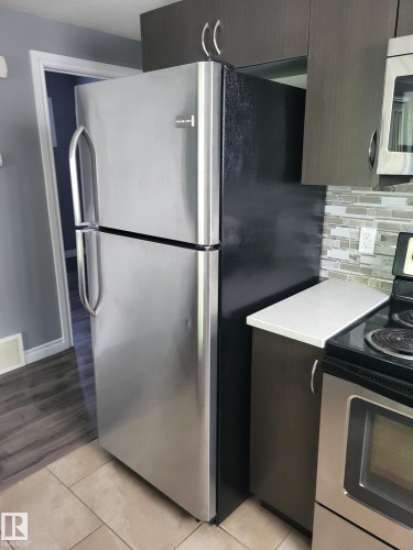 8607 108A Street, Edmonton, AB - Indoor Photo Showing Kitchen With Stainless Steel Kitchen