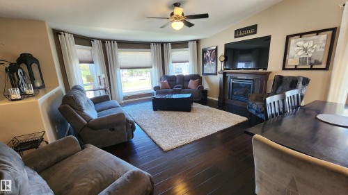 5810 Centennial Drive, Elk Point, AB - Indoor Photo Showing Living Room With Fireplace