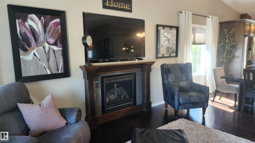 5810 Centennial Drive, Elk Point, AB - Indoor Photo Showing Living Room With Fireplace