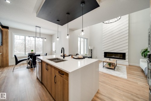 8812 183 Avenue, Edmonton, AB - Indoor Photo Showing Kitchen With Fireplace With Double Sink With Upgraded Kitchen