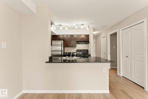 407 1060 Mcconachie Boulevard, Edmonton, AB - Indoor Photo Showing Kitchen With Double Sink