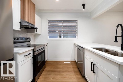 8522/8524 84 Avenue, Edmonton, AB - Indoor Photo Showing Kitchen With Double Sink