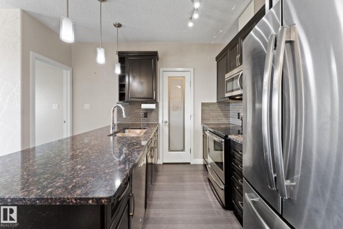 414 507 Albany Way, Edmonton, AB - Indoor Photo Showing Kitchen With Stainless Steel Kitchen With Upgraded Kitchen