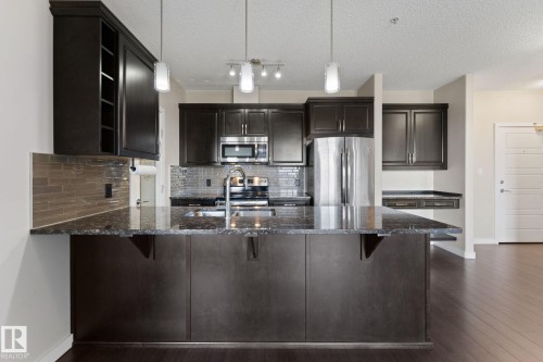 414 507 Albany Way, Edmonton, AB - Indoor Photo Showing Kitchen With Stainless Steel Kitchen With Double Sink With Upgraded Kitchen