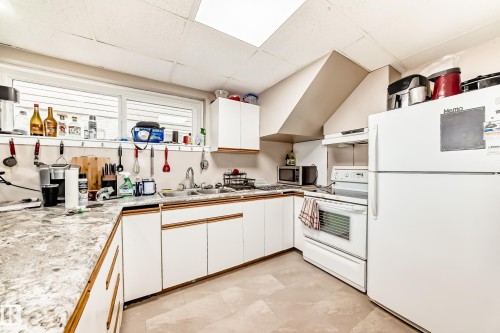7807 108 Street, Edmonton, AB - Indoor Photo Showing Kitchen With Double Sink