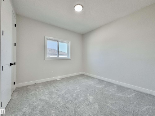 7027 Kiviaq Crescent, Edmonton, AB - Indoor Photo Showing Other Room