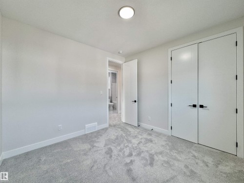 7027 Kiviaq Crescent, Edmonton, AB - Indoor Photo Showing Other Room