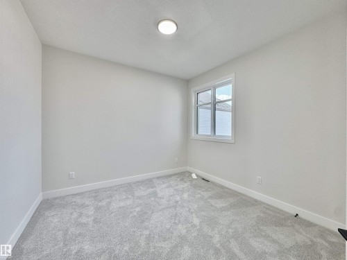 7027 Kiviaq Crescent, Edmonton, AB - Indoor Photo Showing Other Room