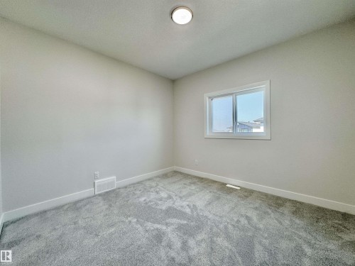 7027 Kiviaq Crescent, Edmonton, AB - Indoor Photo Showing Other Room