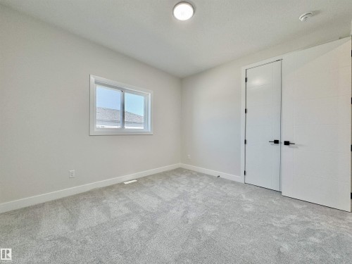 7027 Kiviaq Crescent, Edmonton, AB - Indoor Photo Showing Other Room