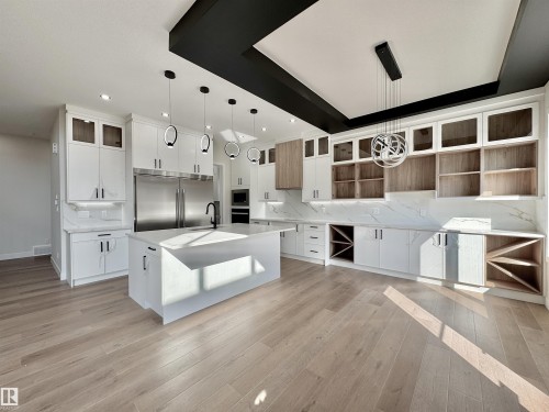 7027 Kiviaq Crescent, Edmonton, AB - Indoor Photo Showing Kitchen With Double Sink With Upgraded Kitchen