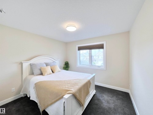8967 24 Avenue, Edmonton, AB - Indoor Photo Showing Bedroom