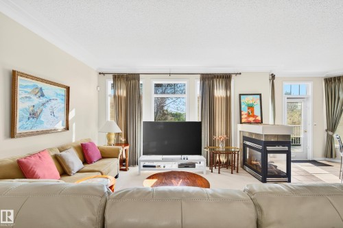 307 Tory View, Edmonton, AB - Indoor Photo Showing Living Room With Fireplace