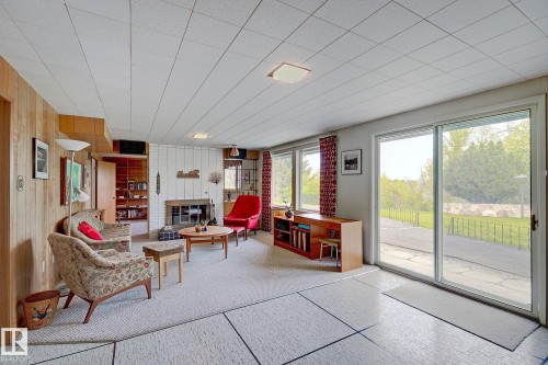 140 Windermere Drive, Edmonton, AB - Indoor Photo Showing Other Room With Fireplace