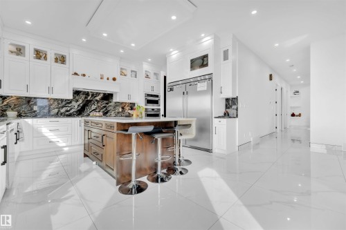 8118 Orchards Green Green, Edmonton, AB - Indoor Photo Showing Kitchen With Upgraded Kitchen