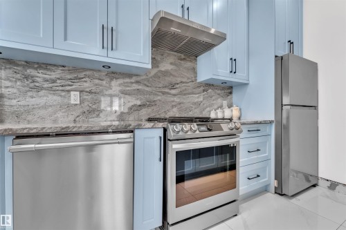 8118 Orchards Green Green, Edmonton, AB - Indoor Photo Showing Kitchen With Upgraded Kitchen