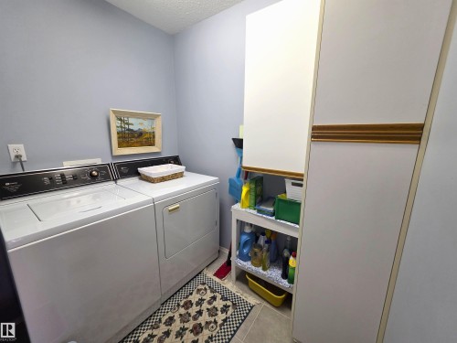 208 Ravine Villa(S), Leduc, AB - Indoor Photo Showing Laundry Room