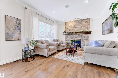 2677 Anderson Crescent, Edmonton, AB - Indoor Photo Showing Living Room With Fireplace