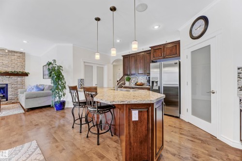2677 Anderson Crescent, Edmonton, AB - Indoor Photo Showing Kitchen With Fireplace With Upgraded Kitchen