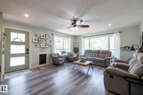 22355 Hwy 623, Rural Leduc County, AB - Indoor Photo Showing Living Room With Fireplace