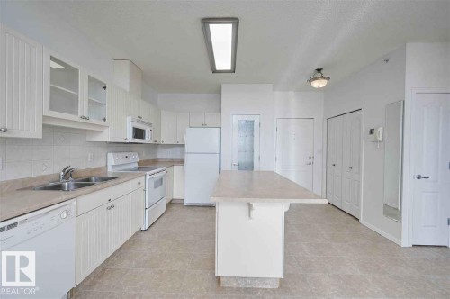Edmonton, AB - Indoor Photo Showing Kitchen With Double Sink