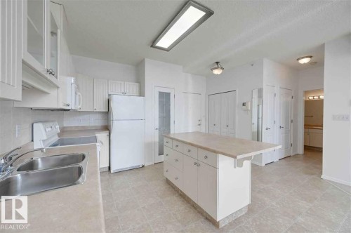 Edmonton, AB - Indoor Photo Showing Kitchen With Double Sink