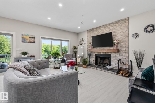 5225 55 55St, Wabamun, AB - Indoor Photo Showing Living Room With Fireplace