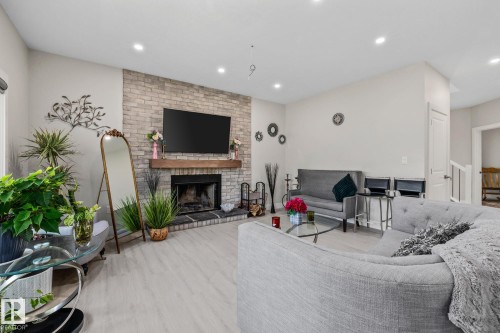 5225 55 55St, Wabamun, AB - Indoor Photo Showing Living Room With Fireplace