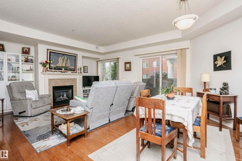 112 260 Sturgeon Road, St. Albert, AB - Indoor Photo Showing Other Room With Fireplace