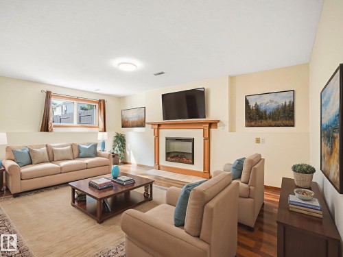 16812 95 Street, Edmonton, AB - Indoor Photo Showing Living Room With Fireplace