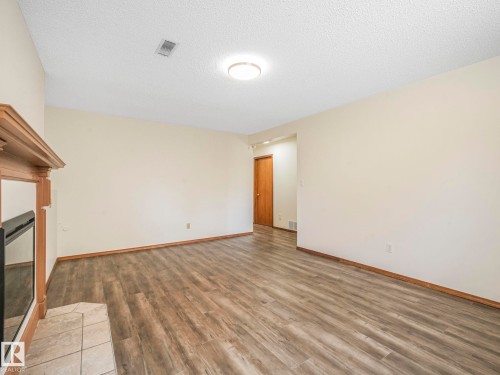 16812 95 Street, Edmonton, AB - Indoor Photo Showing Other Room With Fireplace