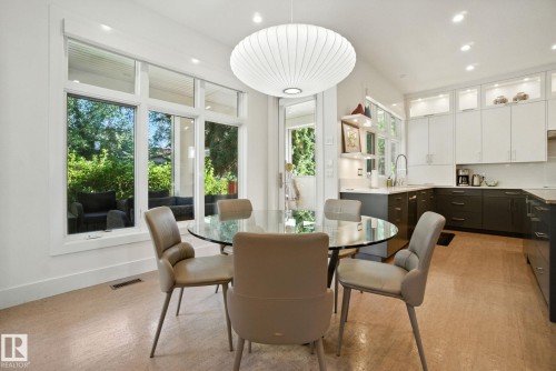 Dining room with recessed lighting and baseboards - 11823 Saskatchewan Drive, Edmonton, AB - Indoor Photo Showing Dining Room
