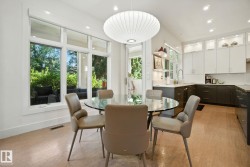 Dining room with recessed lighting and baseboards - 