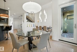 Dining space featuring stairway, recessed lighting, and light wood-type flooring - 