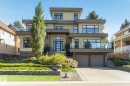 Contemporary house with stucco siding, a balcony, concrete driveway, an attached garage, and stone siding - 11823 Saskatchewan Drive, Edmonton, AB  - Outdoor With Facade 