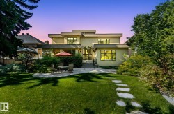 Back of property featuring a patio area and stucco siding - 